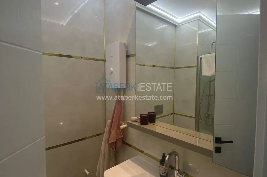 Purchase  Rent in Alanya - 2+1 apartment with furniture and sea view in Mahmutlar B45 16 