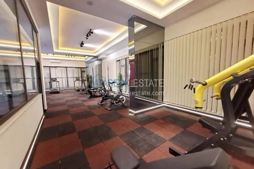 Rent in Alanya - 2+1 apartment with furniture and sea view in Mahmutlar B45 18 