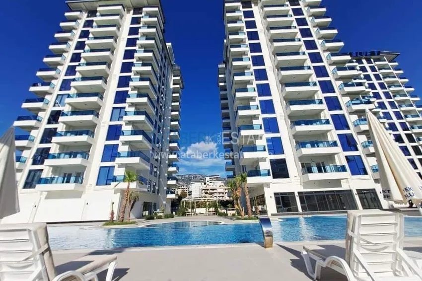Rent in Alanya - 2+1 apartment with furniture and sea view in Mahmutlar B45 2 