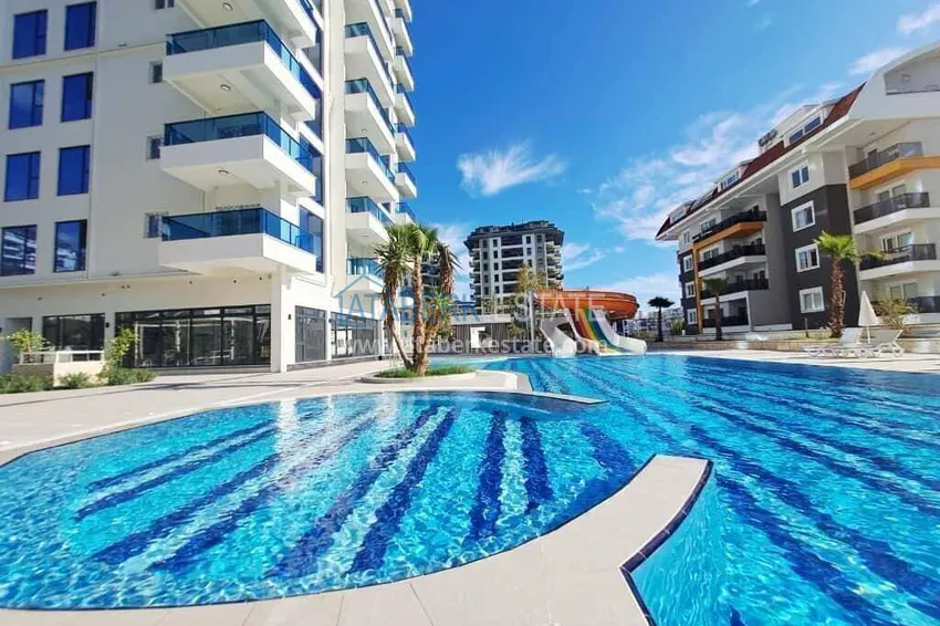 Rent in Alanya - 2+1 apartment with furniture and sea view in Mahmutlar B45 3 