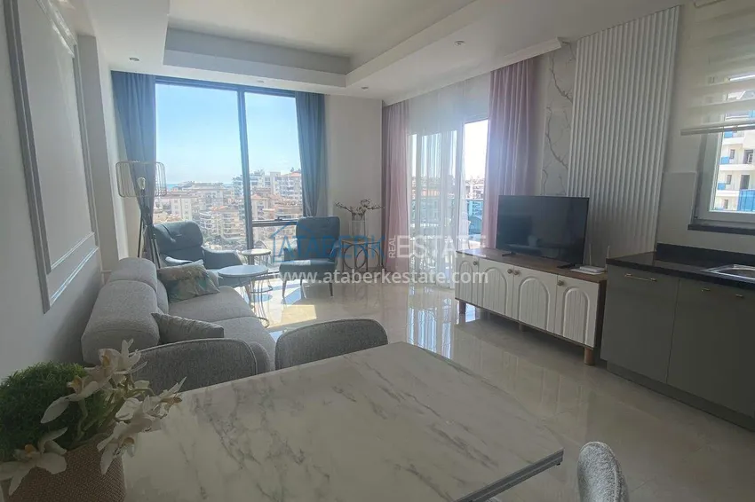 Purchase  Rent in Alanya - 2+1 apartment with furniture and sea view in Mahmutlar B45 3 