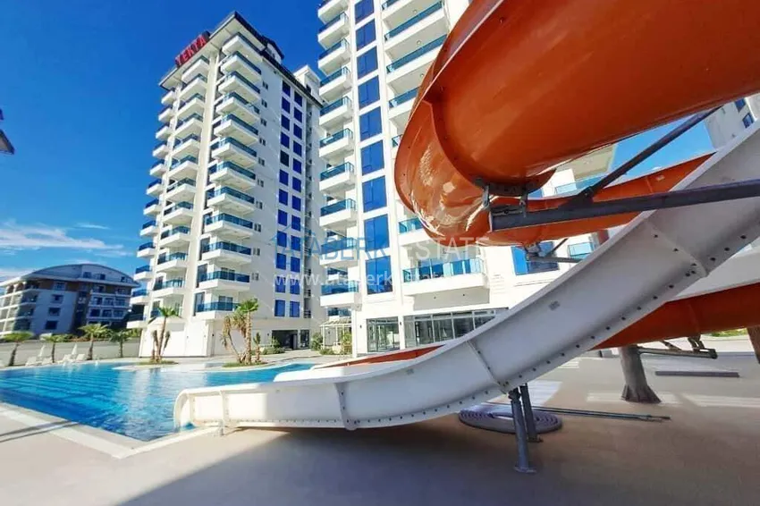 Rent in Alanya - 2+1 apartment with furniture and sea view in Mahmutlar B45 4 
