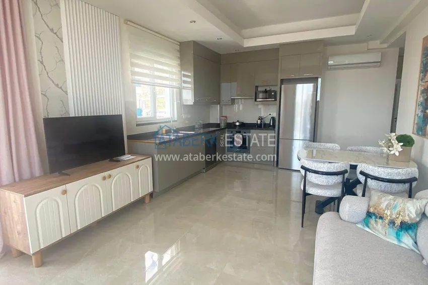Purchase  Rent in Alanya - 2+1 apartment with furniture and sea view in Mahmutlar B45 5 