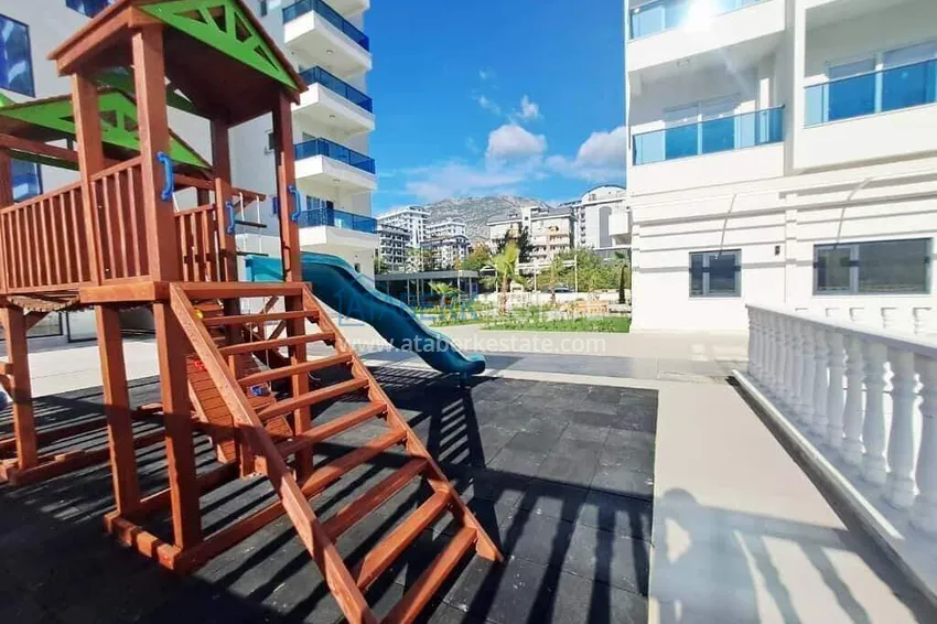 Rent in Alanya - 2+1 apartment with furniture and sea view in Mahmutlar B45 7 