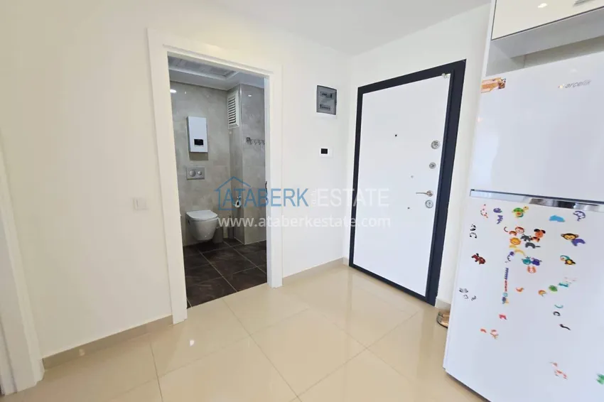 Purchase Furnished 1+1 apartment with partial sea view, Avsallar — Alanya 8
