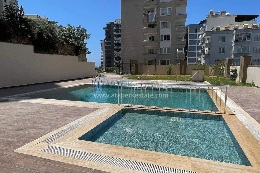Cheap 1+1 apartment in Mahmutlar - furnished and with mountain views 3 