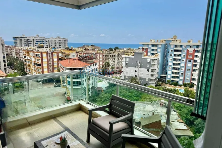 1+1 apartment in Tosmur, 76 m2 with furniture and sea view - property for a residence permit in Alanya  1 