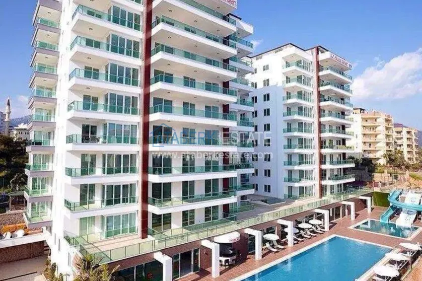 1+1 apartment in Tosmur, 76 m2 with furniture and sea view - property for a residence permit in Alanya  2 