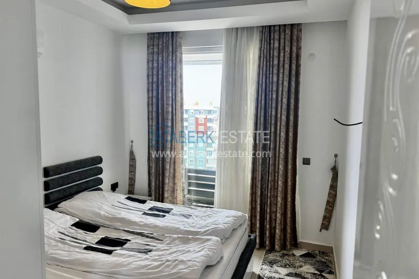 Purchase  1+1 apartment in Tosmur, 76 m2 with furniture and sea view - property for a residence permit in Alanya  12 