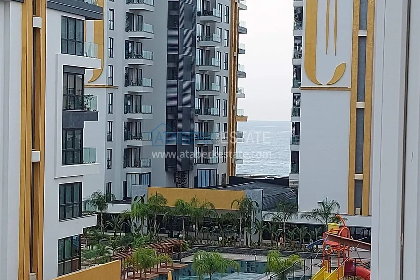 3+1 apartment in Mahmutlar, Barbarossa — linear with a separate kitchen, 150 meters from the sea 4 