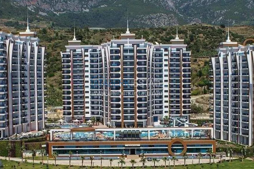 3+1 apartment in Alanya, Mahmutlar district — linear with furniture and panoramic views of the sea and mountains 1