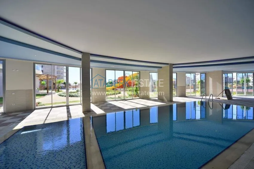 1+1 apartment in Alanya, Cikcilli district - furnished and with sea view, glazed balcony 11 