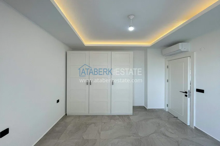 Purchase 2+1 apartment for a residence permit in Alanya, Oba district — furniture, sea and mountain views 12