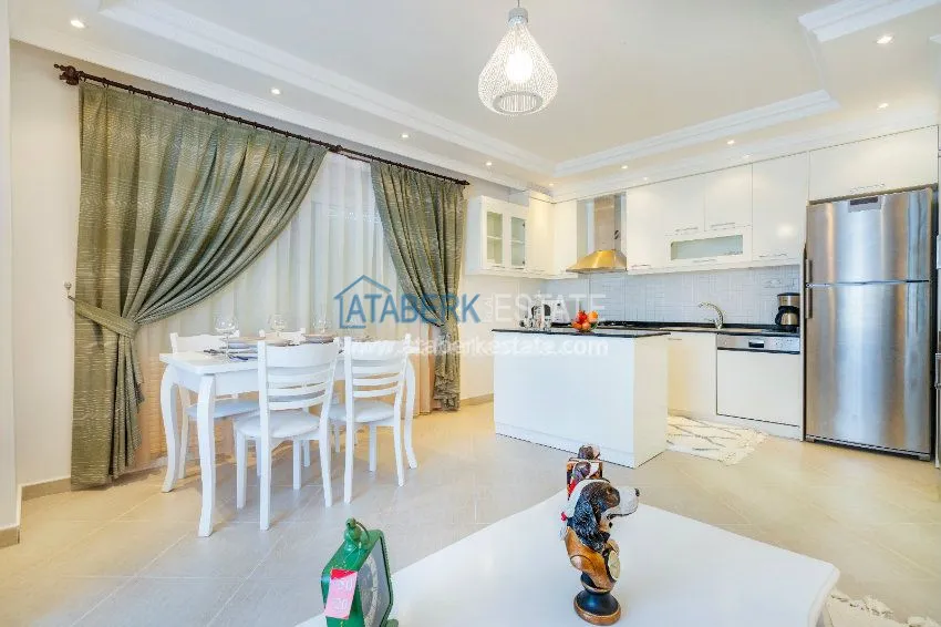 Purchase Четырехкомнатная квартира с отдельной кухней в европейском районе Оба 3 