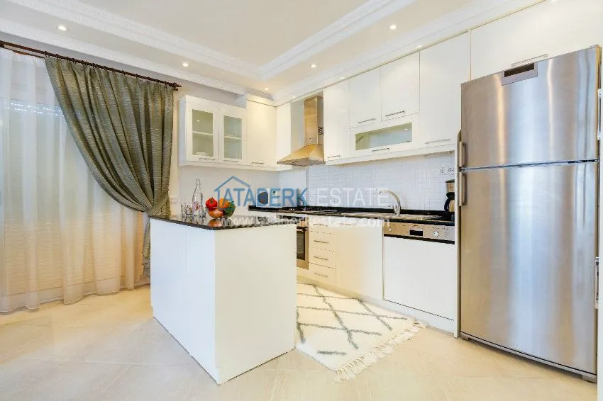 Purchase Четырехкомнатная квартира с отдельной кухней в европейском районе Оба 4 