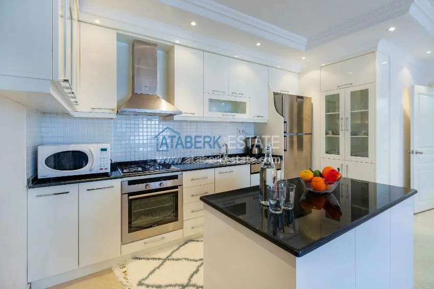 Purchase Четырехкомнатная квартира с отдельной кухней в европейском районе Оба 5 