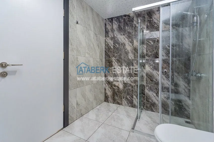 Purchase Четырехкомнатная квартира с отдельной кухней в европейском районе Оба 16 