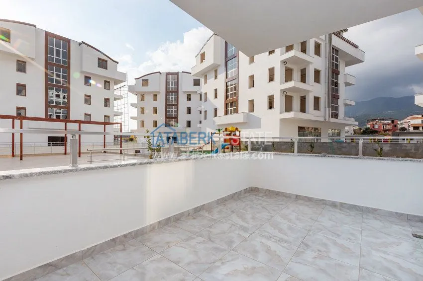 Purchase Четырехкомнатная квартира с отдельной кухней в европейском районе Оба 19 