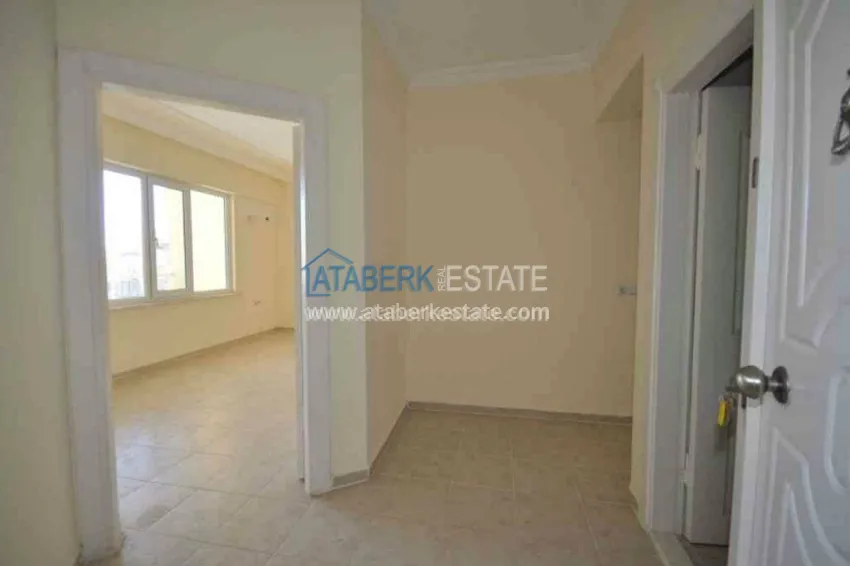 Purchase  2+1 в старом фонде Махмутлара с частичным видом на море 1 