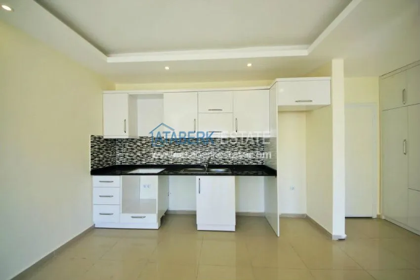 Purchase  Новая квартира 1+1 в Аланье - Махмутлар 7 