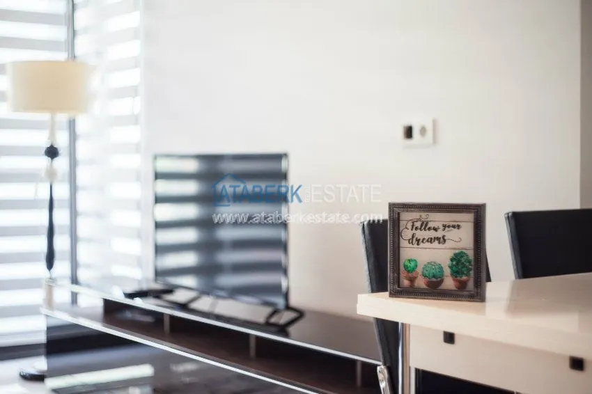 Purchase  1+1 apartment, located 50 meters from the sea in Oba center 12 