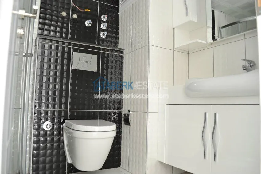 Purchase  Апартаменты 1+1 с мебелью в районе Махмутлар 15 