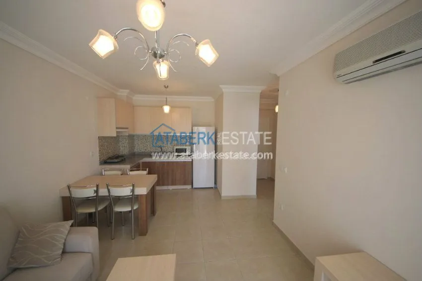 Purchase  Комфортабельные апартаменты 1+1 в центре района Махмутлар 11 