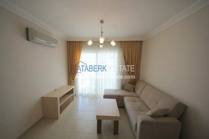 Purchase  Комфортабельные апартаменты 1+1 в центре района Махмутлар 13 