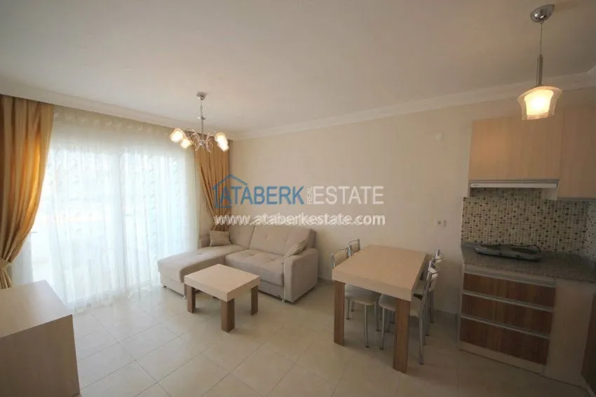 Purchase  Комфортабельные апартаменты 1+1 в центре района Махмутлар 14 