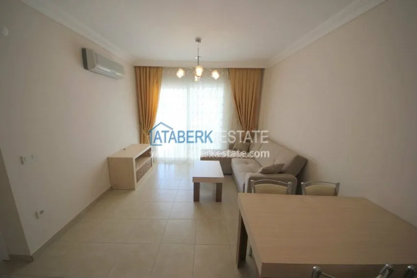 Purchase  Комфортабельные апартаменты 1+1 в центре района Махмутлар 15 