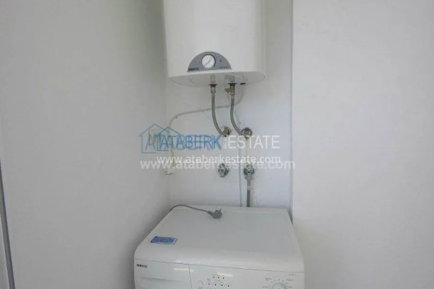 Purchase  Комфортабельные апартаменты 1+1 в центре района Махмутлар 19 