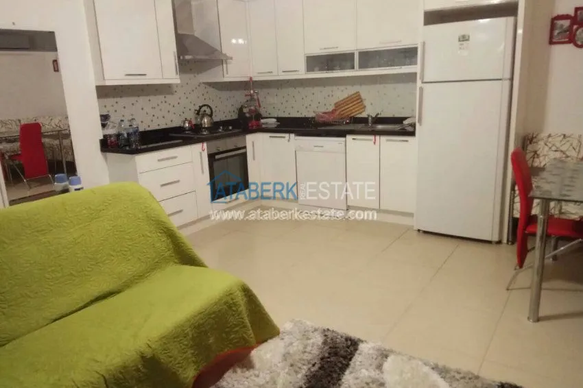 Purchase 1+1 apartment in a modern complex in Avsallar 6