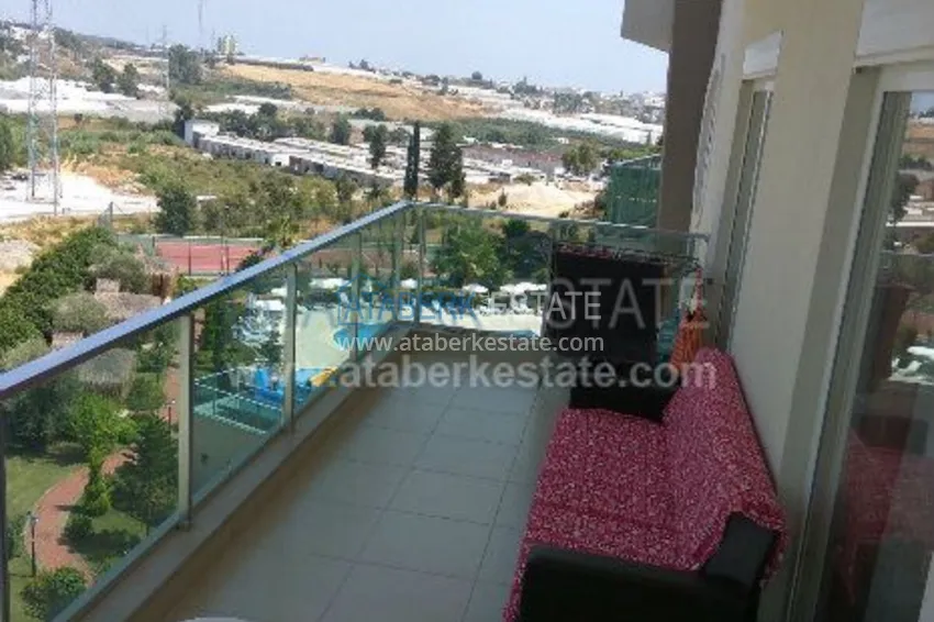 Purchase 1+1 apartment in a modern complex in Avsallar 10