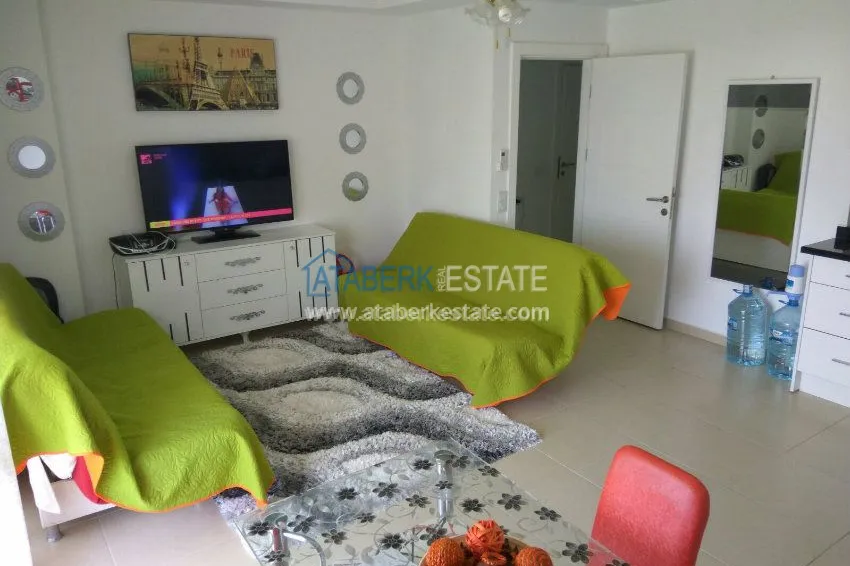 Purchase 1+1 apartment in a modern complex in Avsallar 11