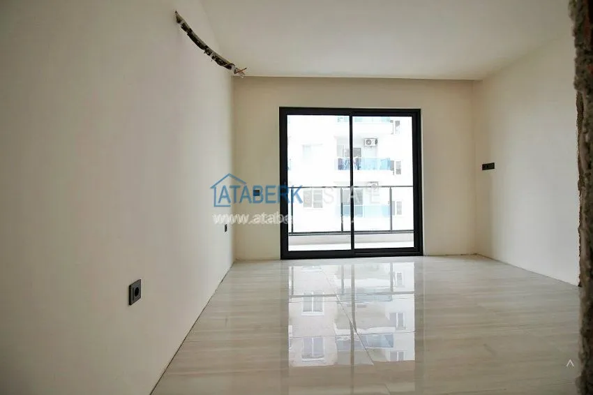 Purchase  Новые апартаменты 1+1 и 2+1 от инвестора в районе Махмутлар 16 