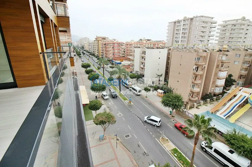 Purchase  Новые апартаменты 1+1 и 2+1 от инвестора в районе Махмутлар 26 