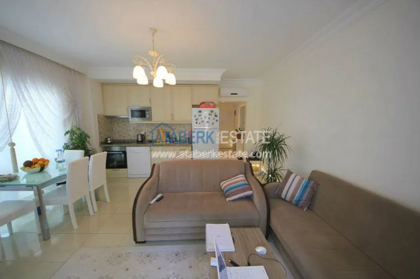 Purchase  Качественно меблированная квартира 1+1 в районе Махмутлар 11 