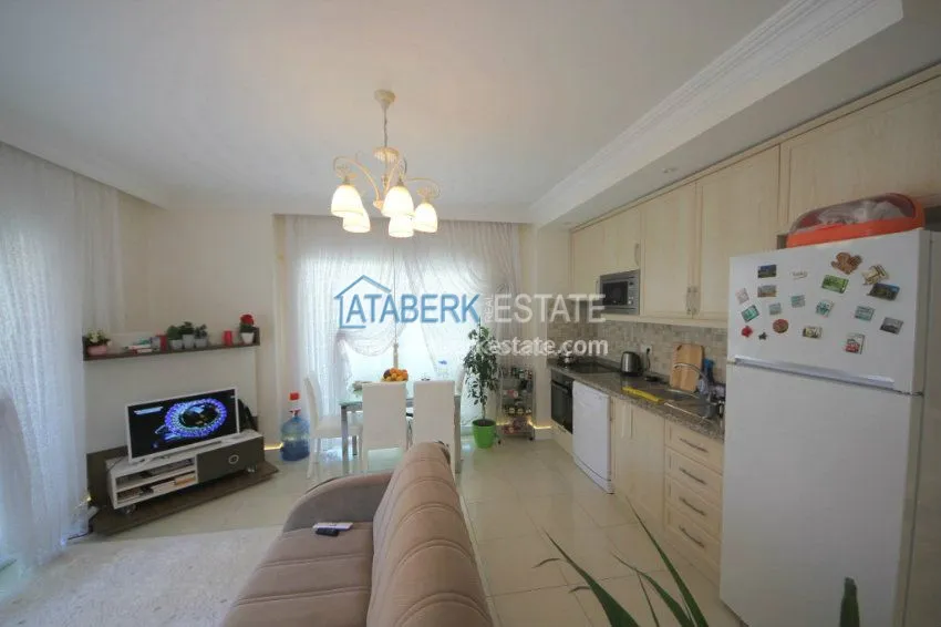 Purchase  Качественно меблированная квартира 1+1 в районе Махмутлар 14 