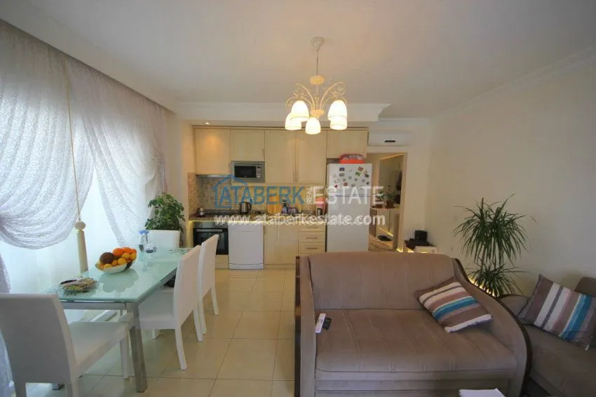 Purchase  Качественно меблированная квартира 1+1 в районе Махмутлар 15 