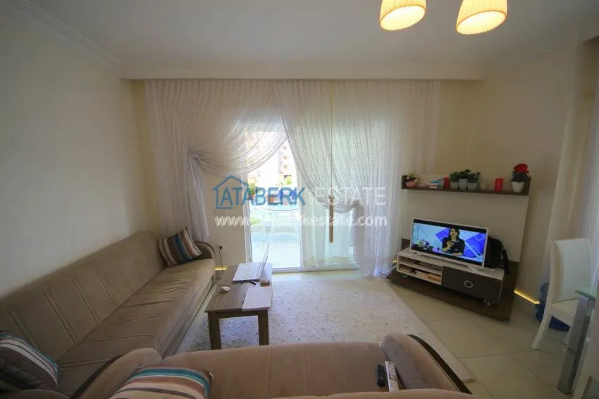 Purchase  Качественно меблированная квартира 1+1 в районе Махмутлар 17 