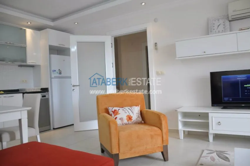 Purchase  1+1 apartment with a private beach in Avsallar 11 