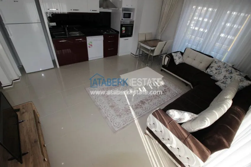 Purchase Двухкомнатные апартаменты в новом комплексе в Махмутларе 9 