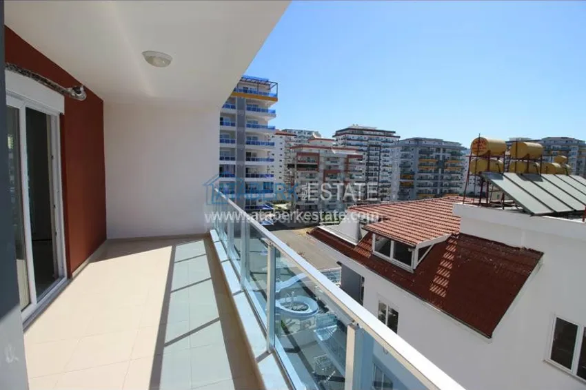 Purchase Двухкомнатные апартаменты в новом комплексе в Махмутларе 10 