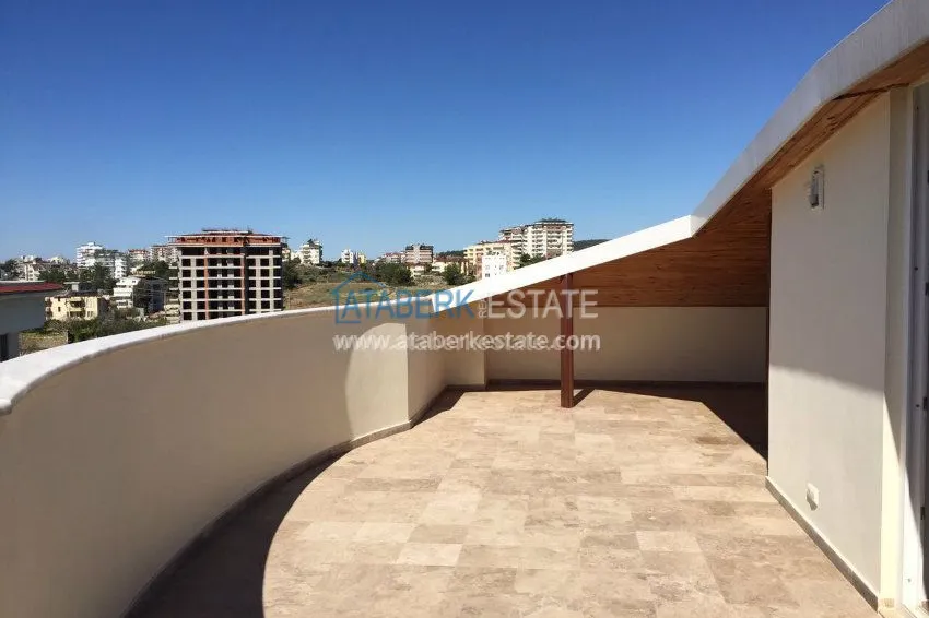 В районе Авсалар 3+1 дуплекс с камином и сауной. 6 