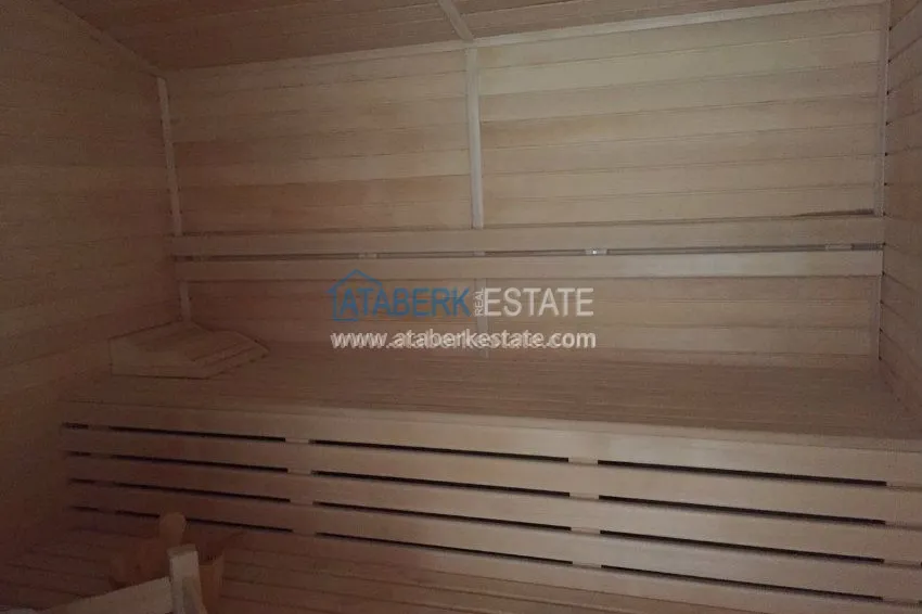 В районе Авсалар 3+1 дуплекс с камином и сауной. 12 