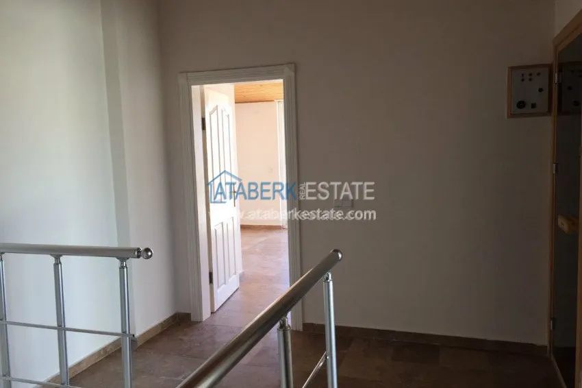 В районе Авсалар 3+1 дуплекс с камином и сауной. 14 