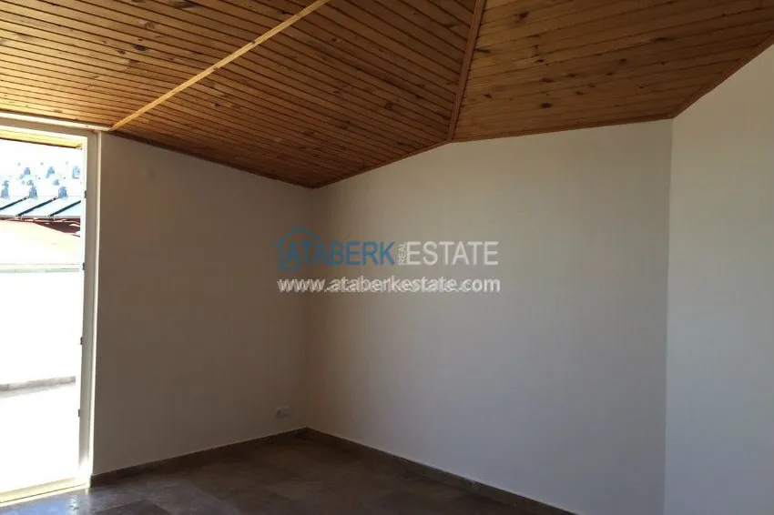 В районе Авсалар 3+1 дуплекс с камином и сауной. 19 