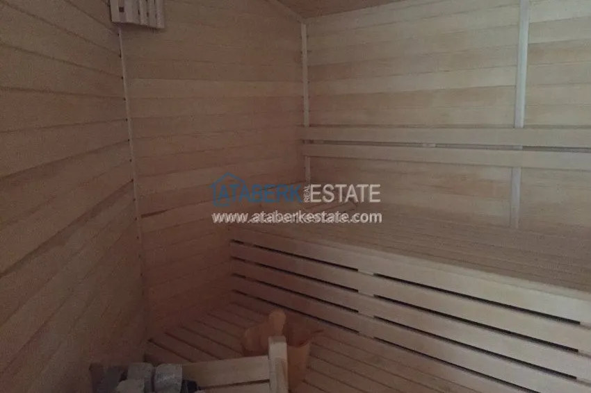 В районе Авсалар 3+1 дуплекс с камином и сауной. 20 