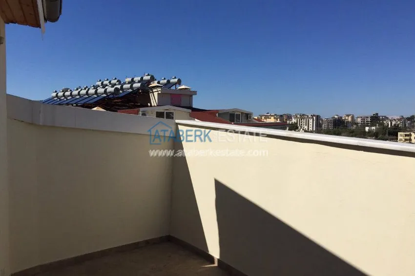 В районе Авсалар 3+1 дуплекс с камином и сауной. 21 