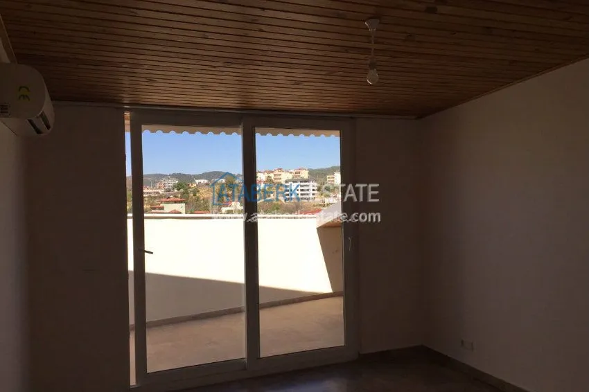 В районе Авсалар 3+1 дуплекс с камином и сауной. 24 